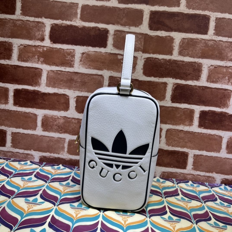 G*u*i top handle bags